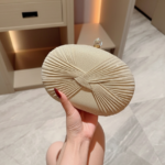 Shiny Bow Design Egg-Shaped Mini Clutch Bag